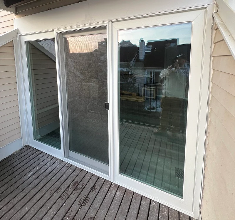 Harvey triple vinyl patio door installed in Stamford,CT by WIndow Solutions Plus