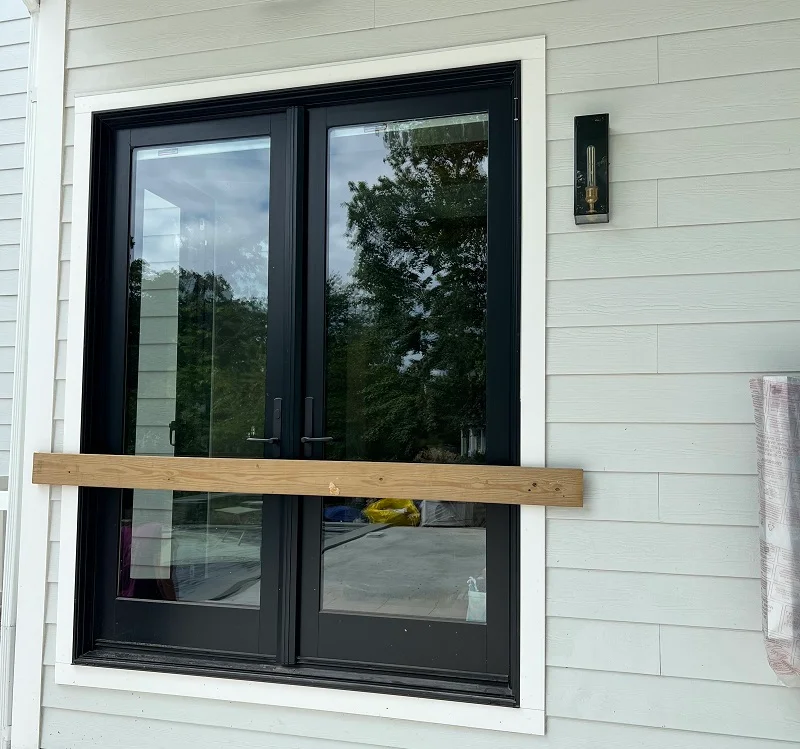 Converting this patio door in Scarsdale to a picture window