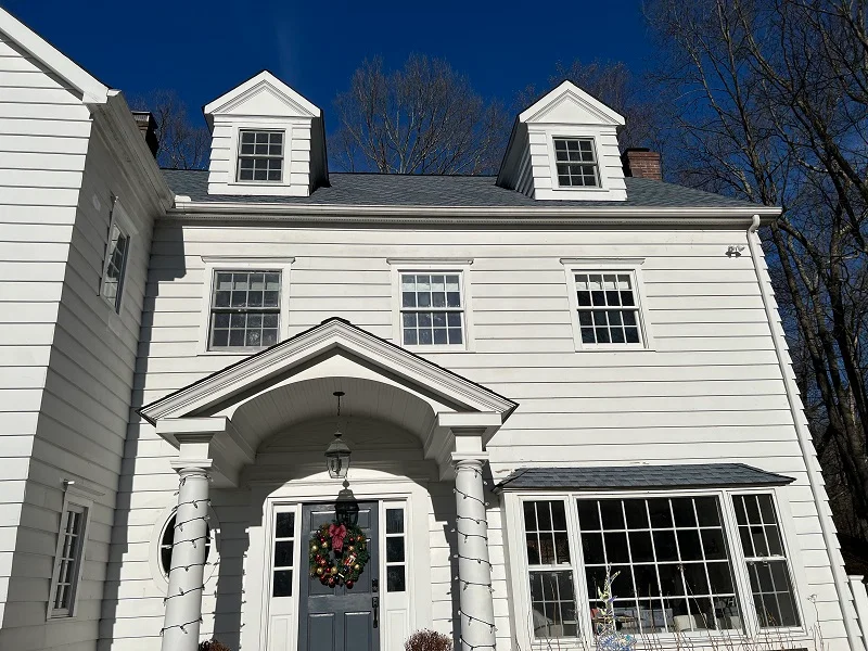 Wilton colonial home in need of new windows