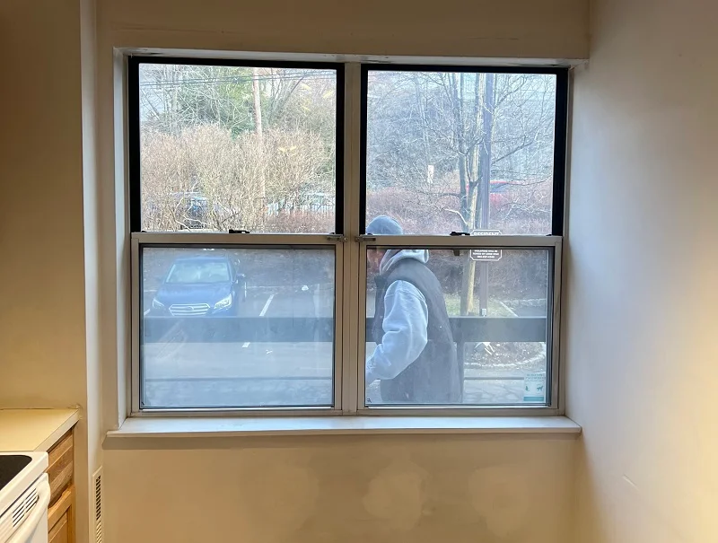 Aluminum two wide double hung window with failed seals in Stamford, CT