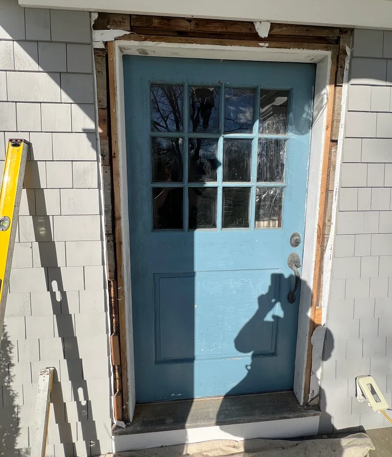 Entry door with exterior casing removed in preparation for installation